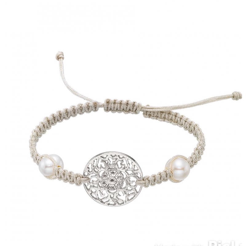 Sterling silver bracelet mounted with silk macrame